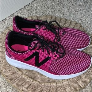 Pink New Balance tennis shoes